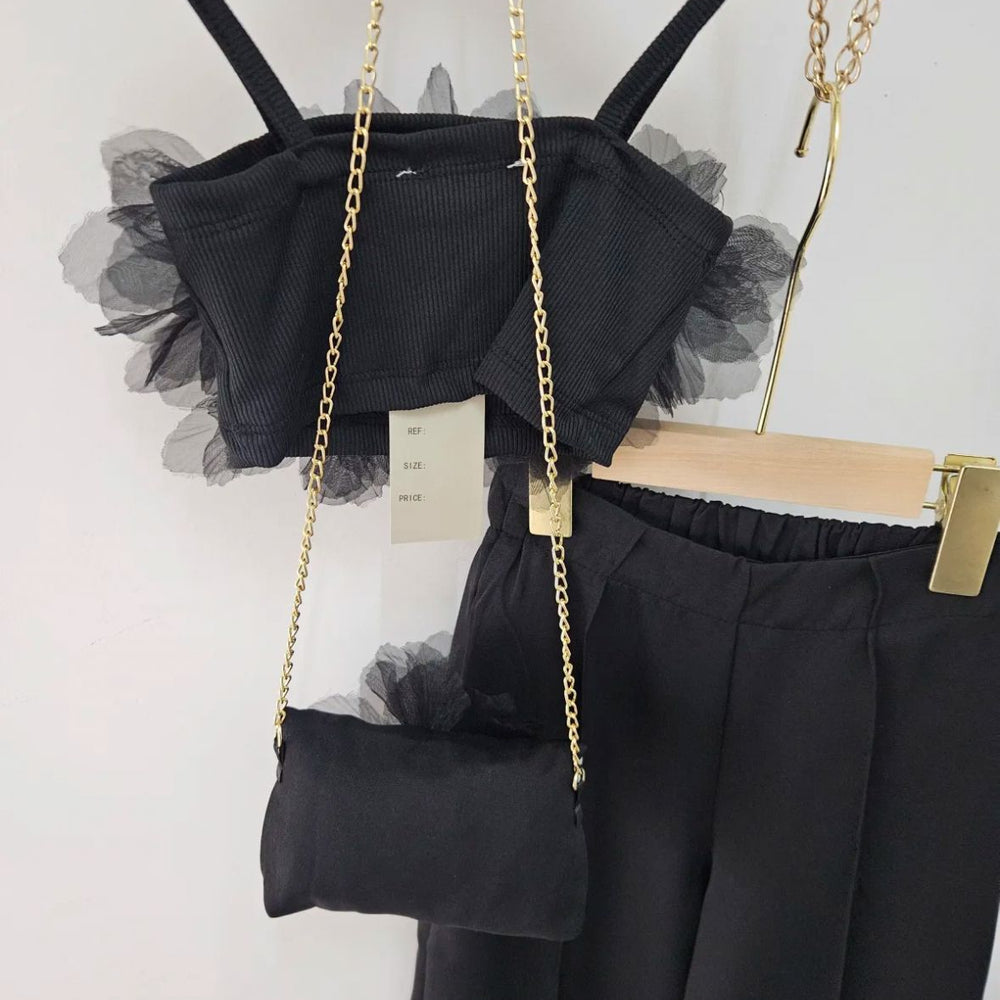 
                      
                        Ensemble Chic Noir Fille – Top Fleurs & Pantalon
                      
                    