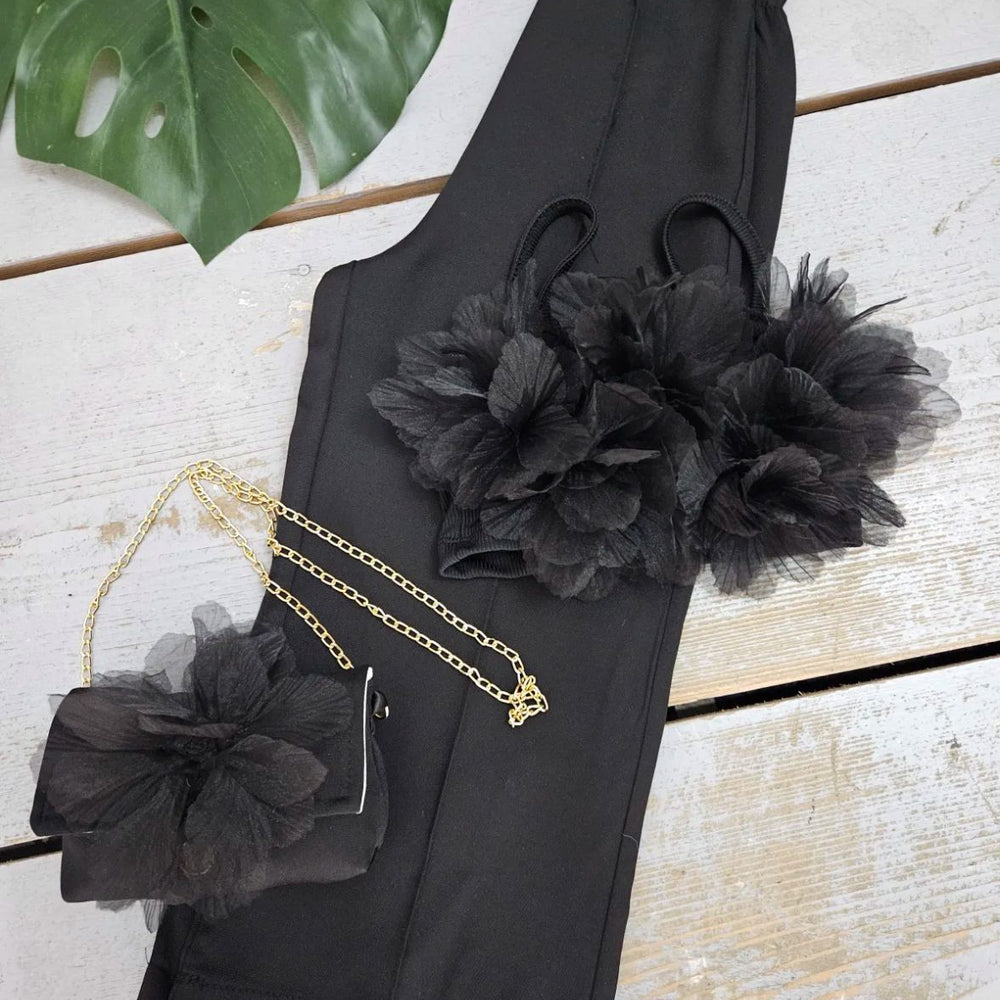 
                      
                        Ensemble Chic Noir Fille – Top Fleurs & Pantalon
                      
                    